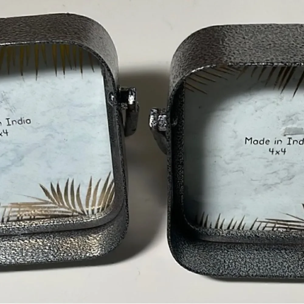 2 metal 4x4 photo frames